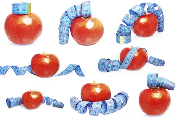 Manzanas y cinta métrica —  Fotos de Stock