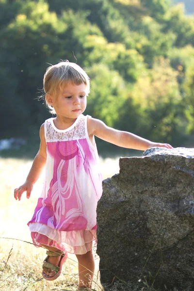 Beautiful little girl on nature — Stock Photo, Image