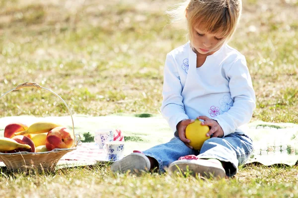 Little girl on a picnic — Stock Photo, Image