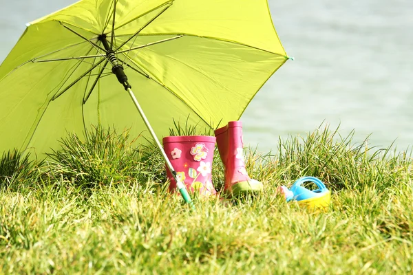 Rubber boots and umbrella — Stock Photo, Image