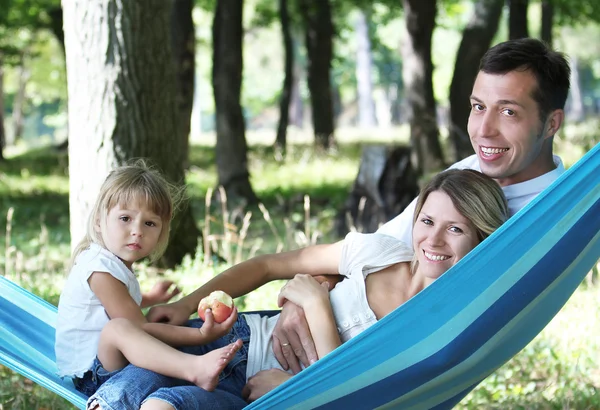 Family on a hammock — Stock Photo, Image