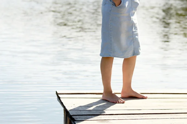 Legs of young girl on nature — Stock Photo, Image