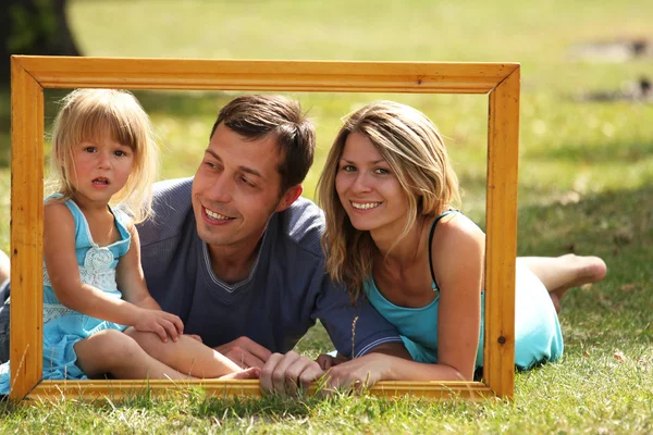 Familia en un marco — Foto de Stock