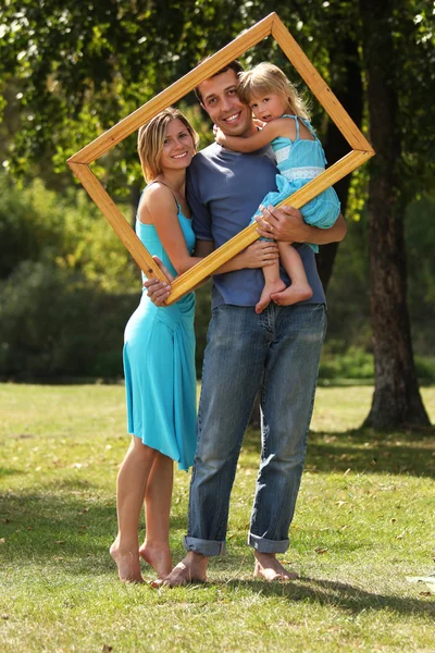 Familia en un marco — Foto de Stock