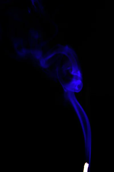 Incense stick with smoke trail on nintendo background — Stock Photo, Image