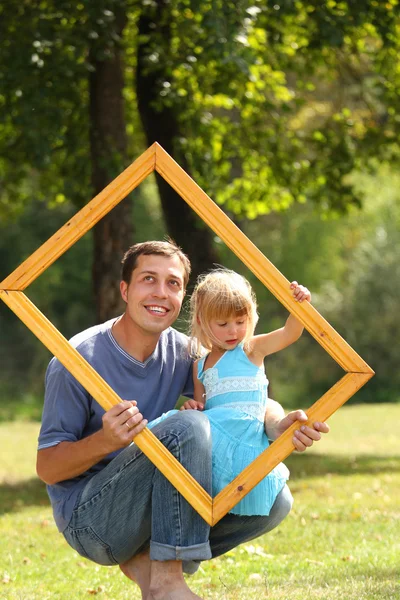 Father with daughter in a frame — Stock Photo, Image