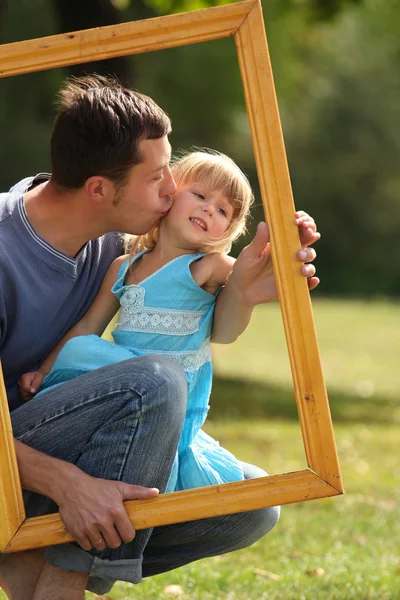 Father with his daughter in the frame — Stock Photo, Image