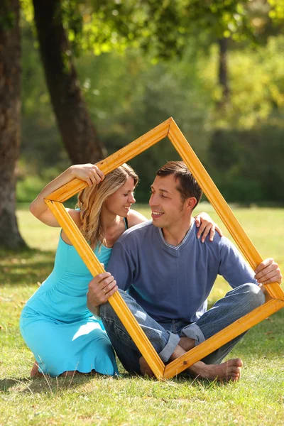 Casal apaixonado no quadro — Fotografia de Stock