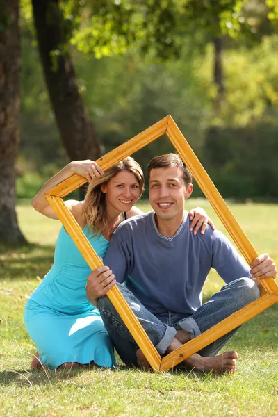 Casal apaixonado no quadro — Fotografia de Stock