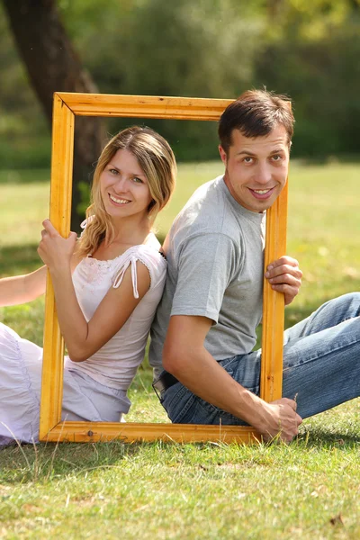 Casal apaixonado no quadro — Fotografia de Stock