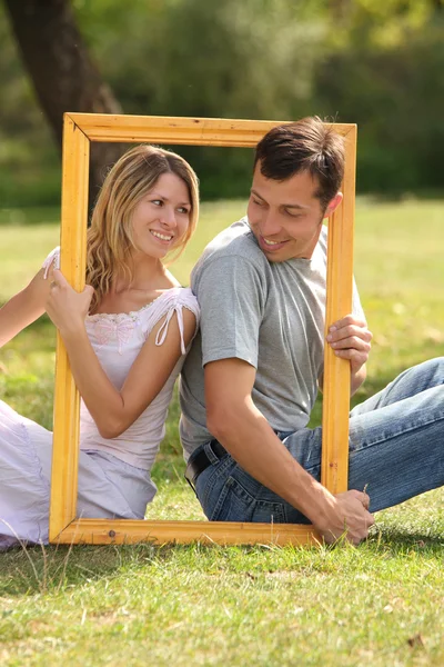 Casal apaixonado no quadro — Fotografia de Stock