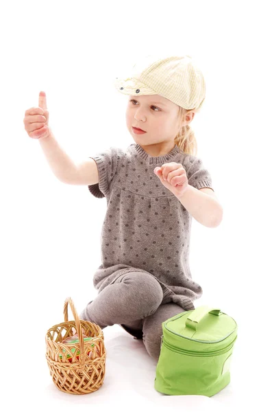 Hermosa niña sobre un fondo blanco — Foto de Stock