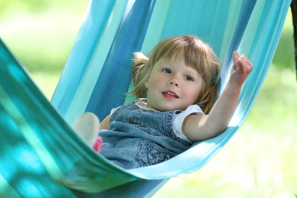 Little girl in a hammock — Stock Photo, Image