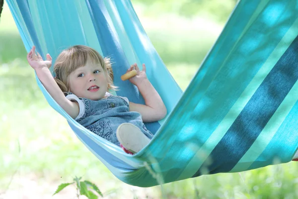 Little girl in a hammock — Stock Photo, Image