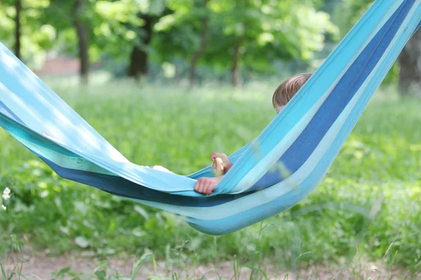 Little girl in a hammock — Stock Photo, Image