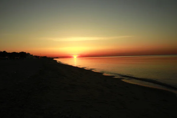 Dawn sun on the sea — Stock Photo, Image