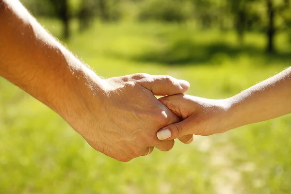 Two pairs of hands in love — Stock Photo, Image