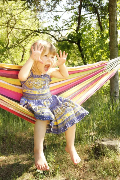 Little girl in a hammock — Stock Photo, Image