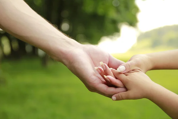 Hands of father, mother and child outdoors — Stock Photo, Image