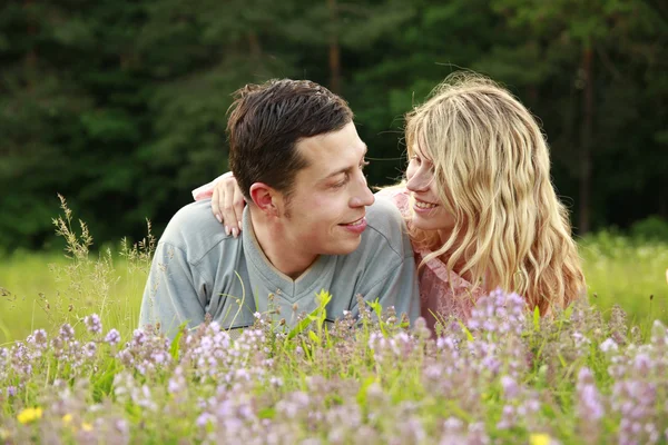 Young beautiful couple in love outdoors — Stock Photo, Image