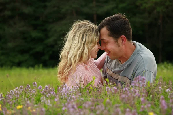 Young beautiful couple in love outdoors — Stock Photo, Image