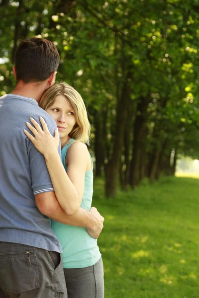 Young beautiful couple in love outdoors — Stock Photo, Image