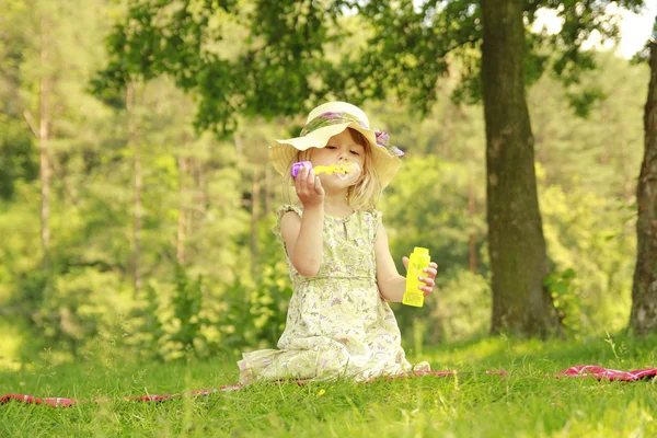 Little girl with soap bubbles — Stock Photo, Image