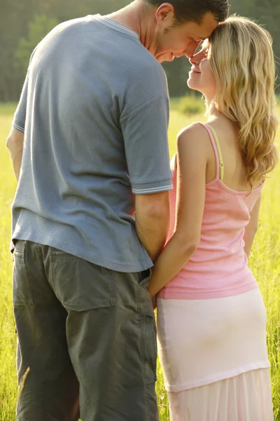 Young beautiful couple in love outdoors — Stock Photo, Image