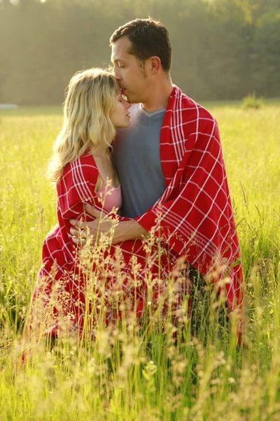 Young beautiful couple in love outdoors — Stock Photo, Image