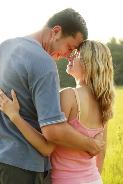 Young beautiful couple in love outdoors — Stock Photo, Image