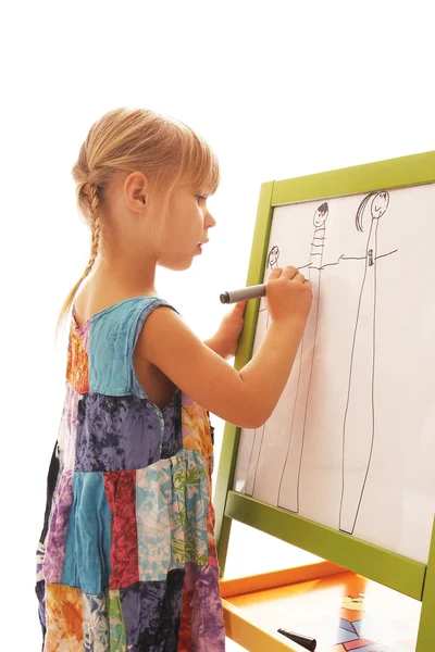 Menina desenha em um fundo branco — Fotografia de Stock