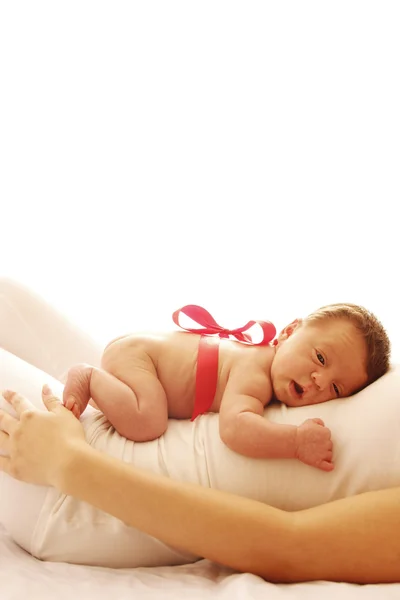 Newborn baby lying on his mom — Stock Photo, Image