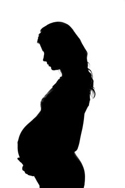 Hamile bir kadının silueti.