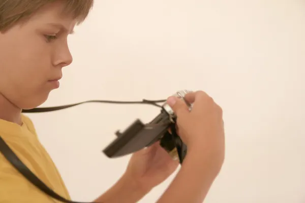 Child with old camera — Stock Photo, Image