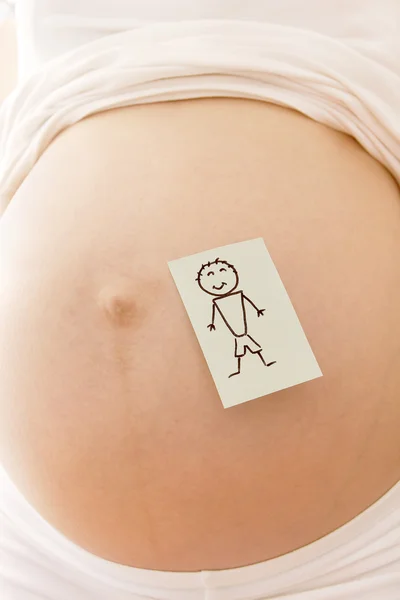 Pregnant woman with stickers — Stock Photo, Image