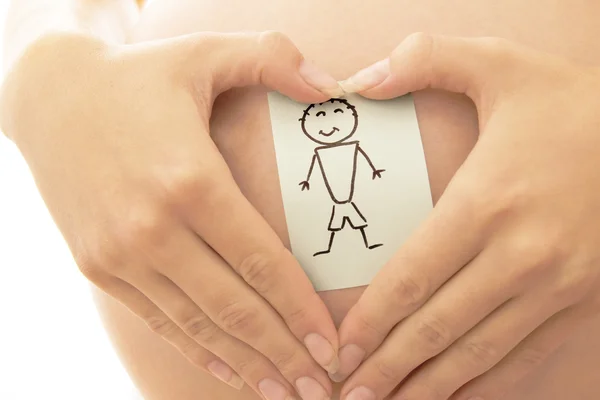 Беременная женщина с наклейками — стоковое фото