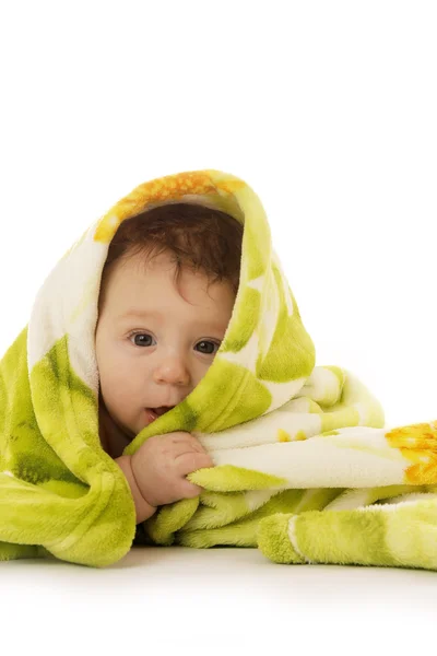 Child on a white background under a blanket — Stock Photo, Image
