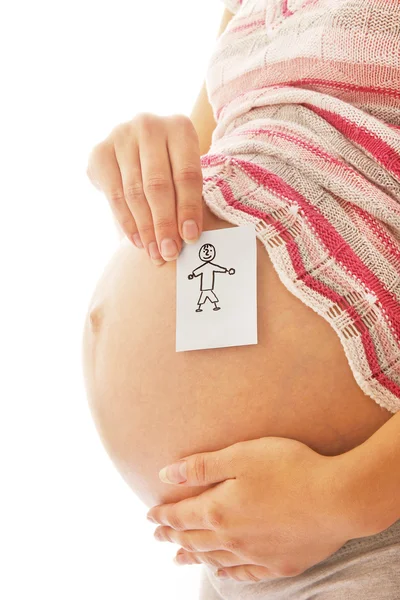 Беременная женщина с наклейками — стоковое фото