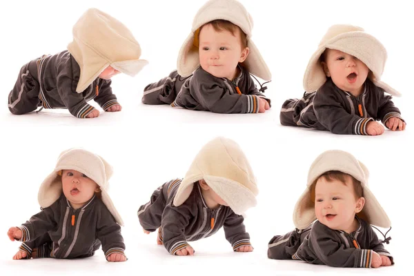 Koleksiyon şapkalı bir şirin yeni doğan bebek — Stok fotoğraf
