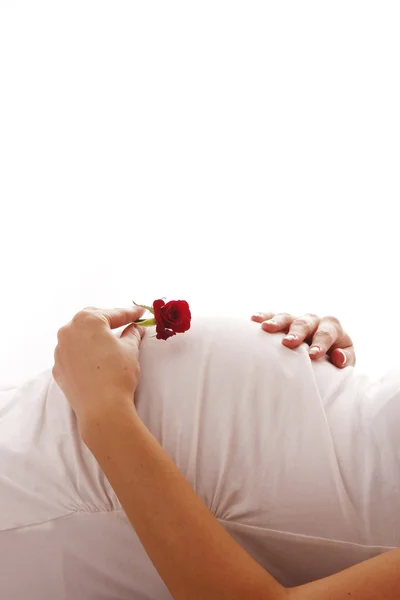 Στομάχι έγκυος γυναίκα σε άσπρο φόντο — Φωτογραφία Αρχείου