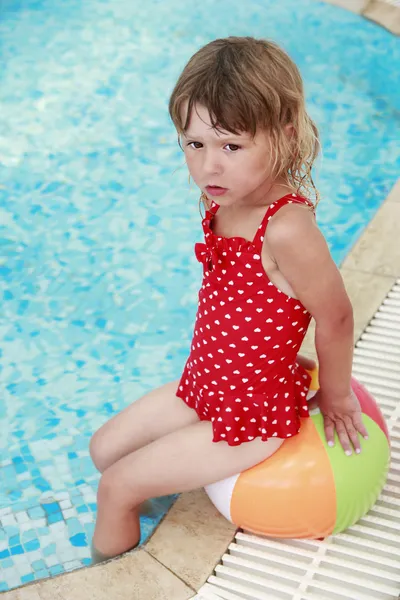 Little cute girl in water pool — Stock Photo, Image