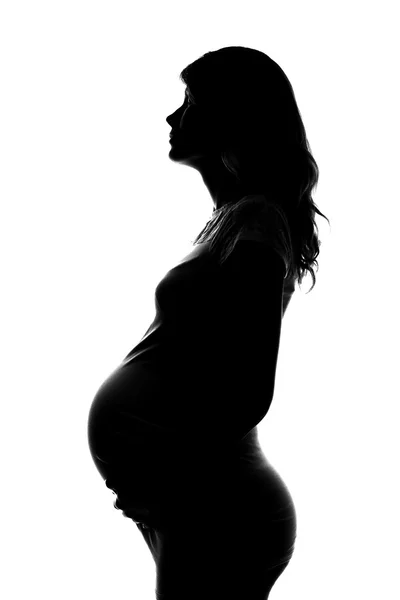 Silhouette of a pregnant woman — Stock Photo, Image