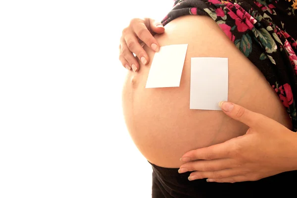 Pregnant woman with stickers Stock Picture