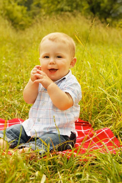 Baby sitting in nature — Stock Photo, Image