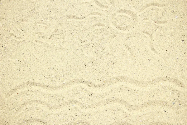 Waves, sun and word 'Sea' on sand — Stock Photo, Image