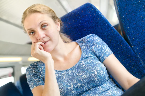 Women think about something in a train — Stock Photo, Image