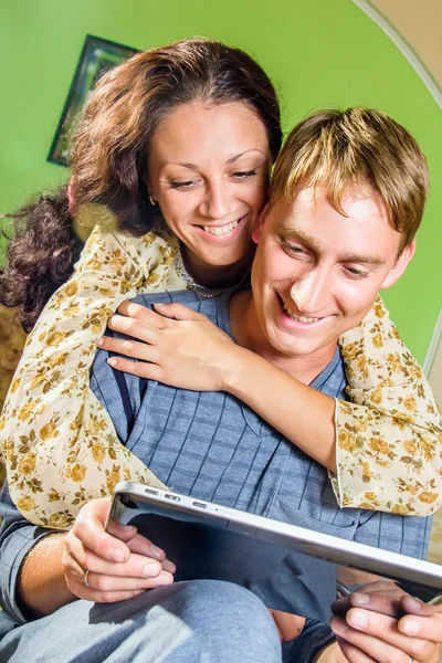 Happy couple with tablet pc Stock Image