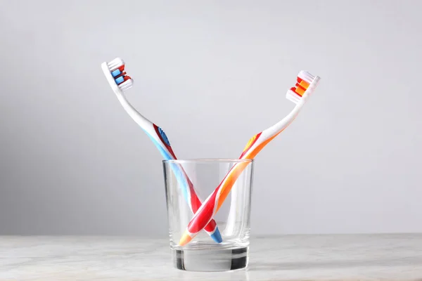 Two Toothbrushes Glass Copy Space Your Text — Stock Photo, Image