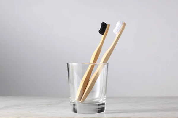 Two Bamboo Toothbrushes Glass Copy Space Your Text — Stock Photo, Image