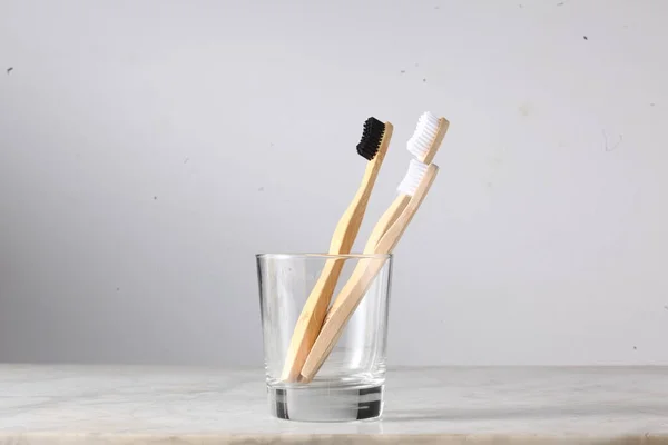 Three Bamboo Toothbrushes Parents Child Glass Copy Space Your Text — Stock Photo, Image